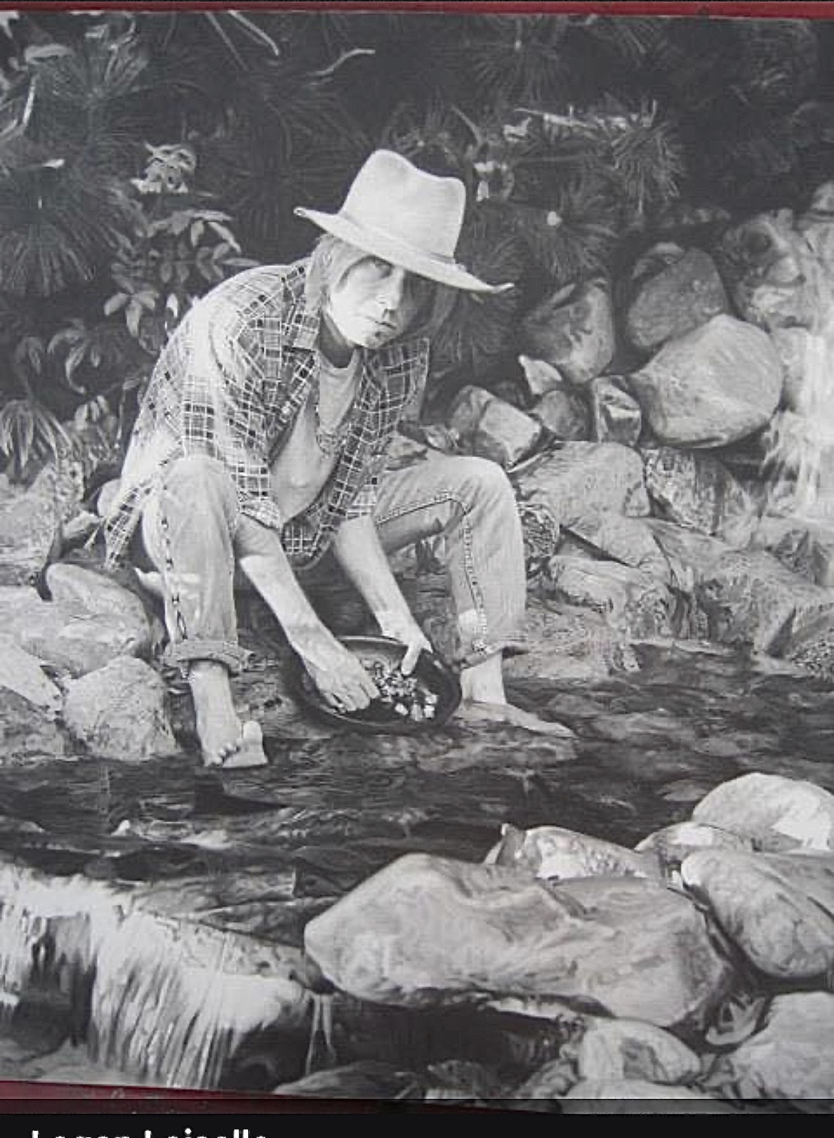 Graphite pioneer panning for gold